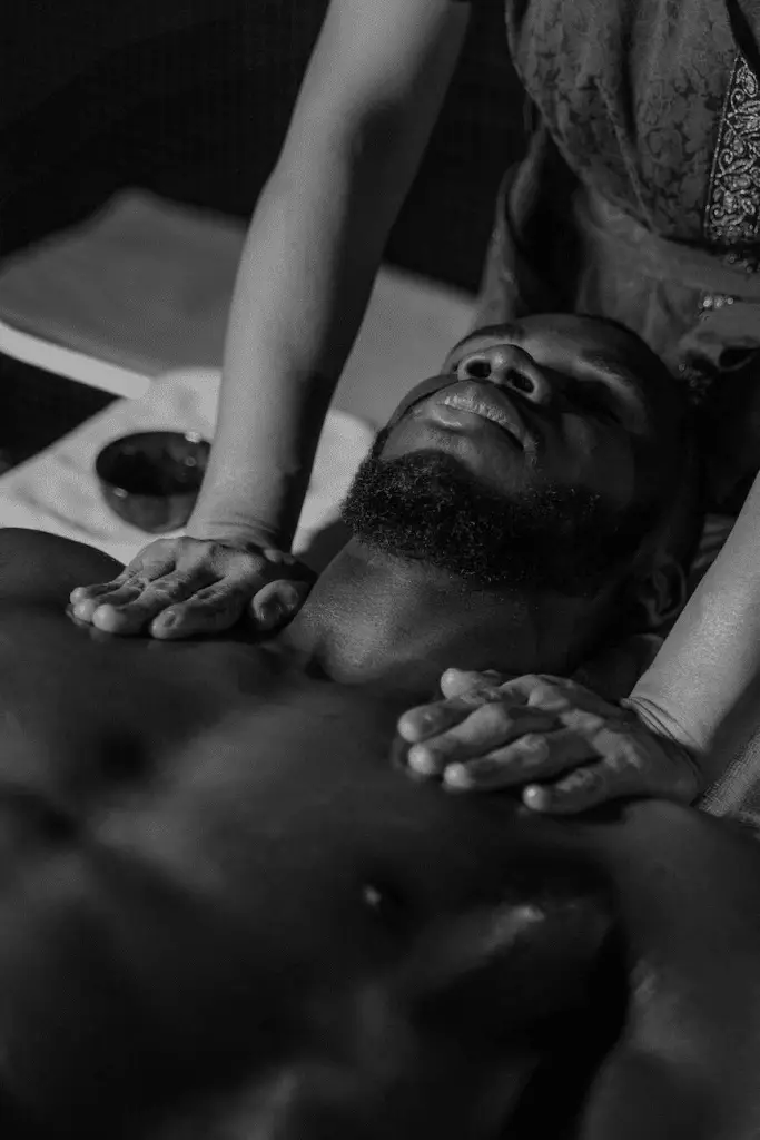 An individual receiving a relaxing deep tissue massage in a serene setting.