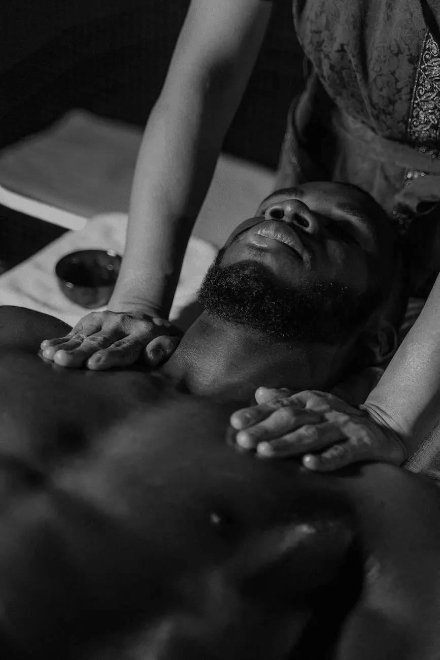 An individual receiving a relaxing deep tissue massage in a serene setting.