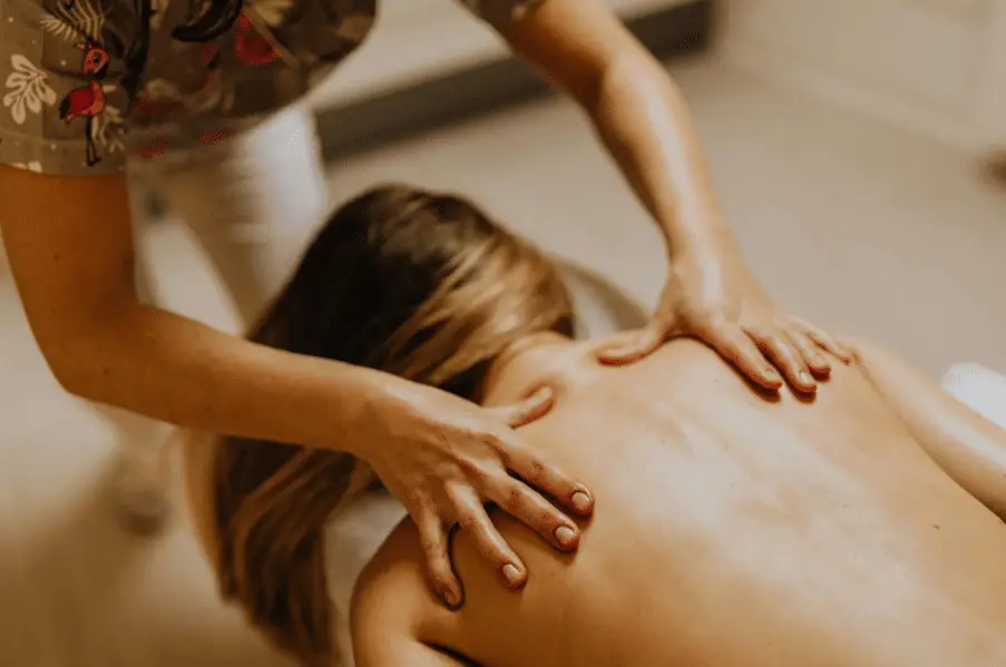 A massage expert using custom massage techniques.