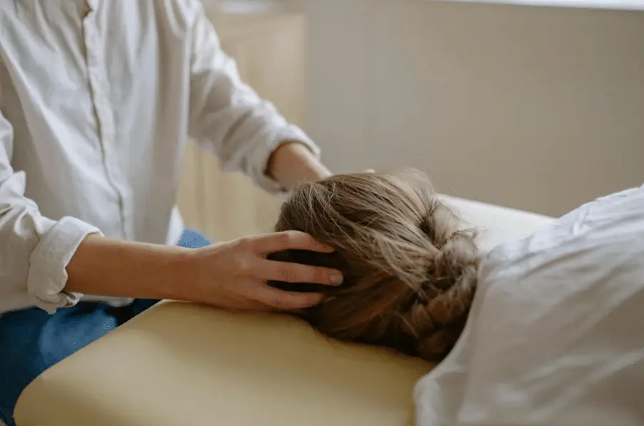 A woman getting a full body massage.