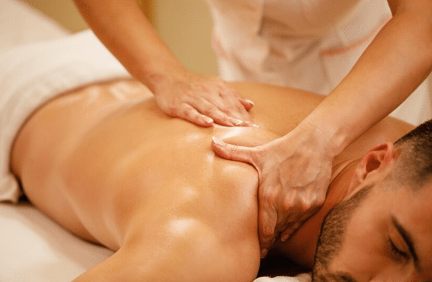 A picture of a person getting a full body massage