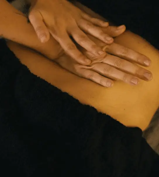 A person getting a full-body massage in Minneapolis.