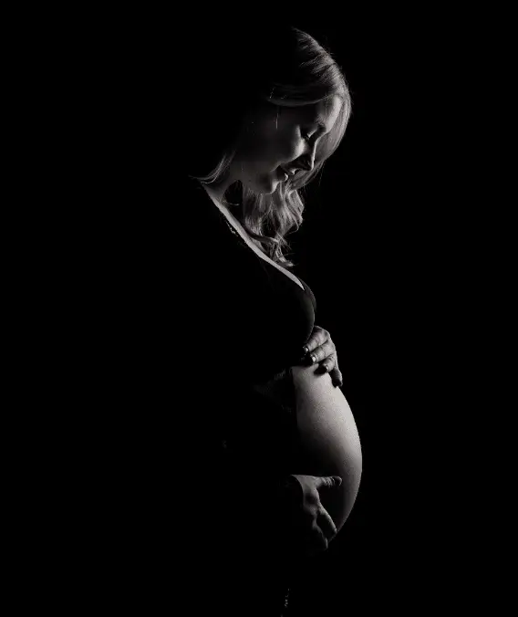 A woman going for a prenatal massage therapy.