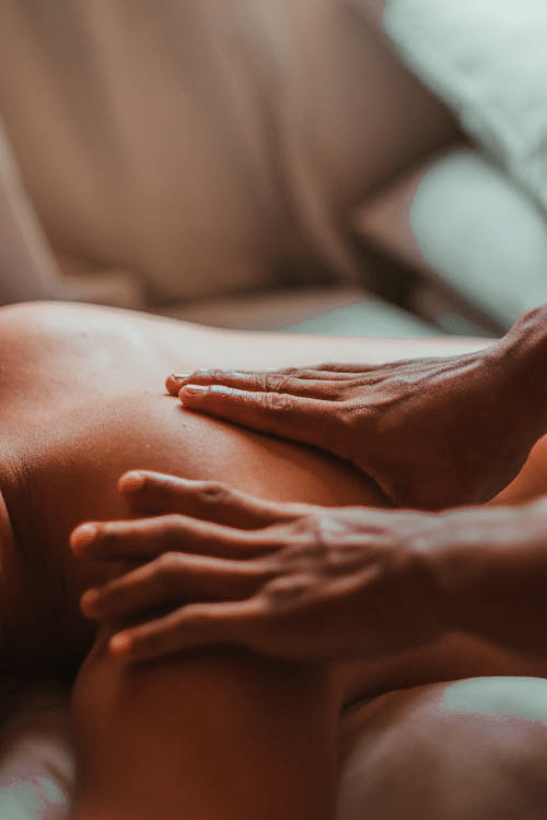 hands giving a relaxing shoulder massage