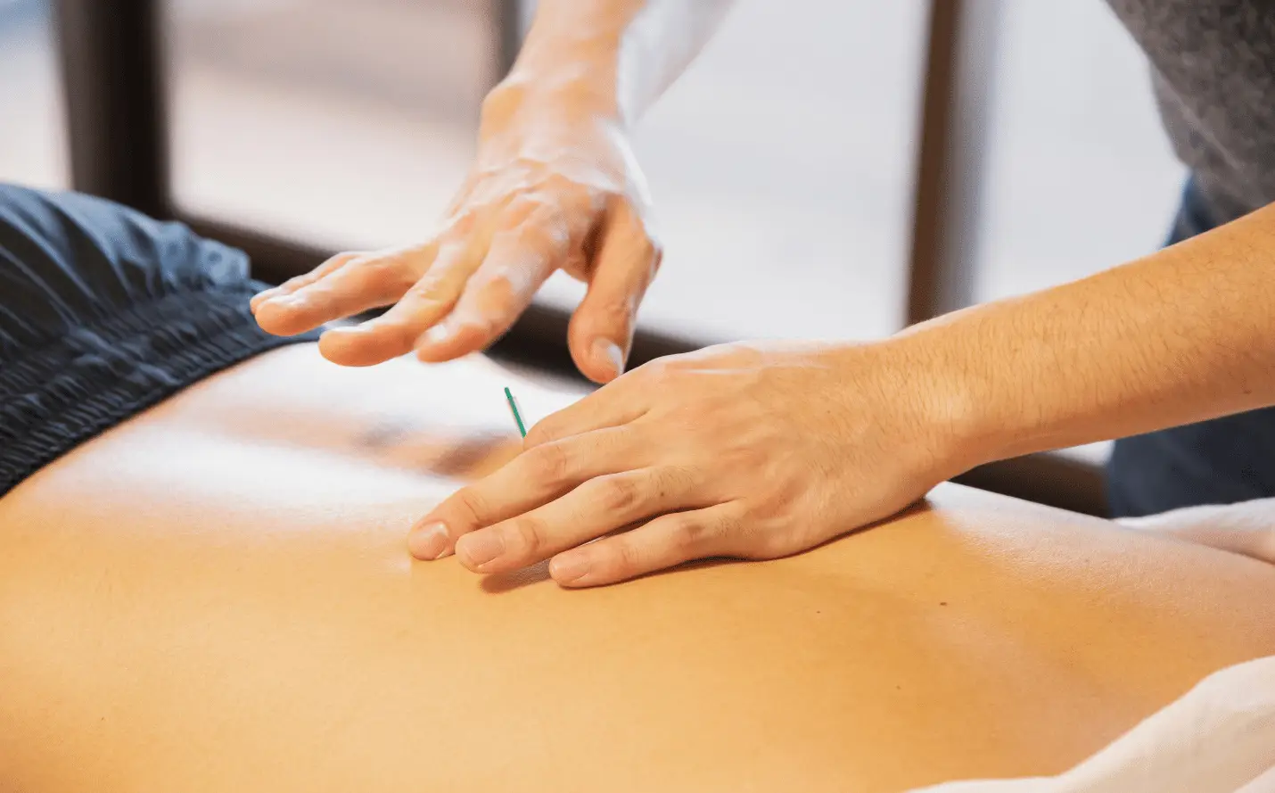 A person giving a massage