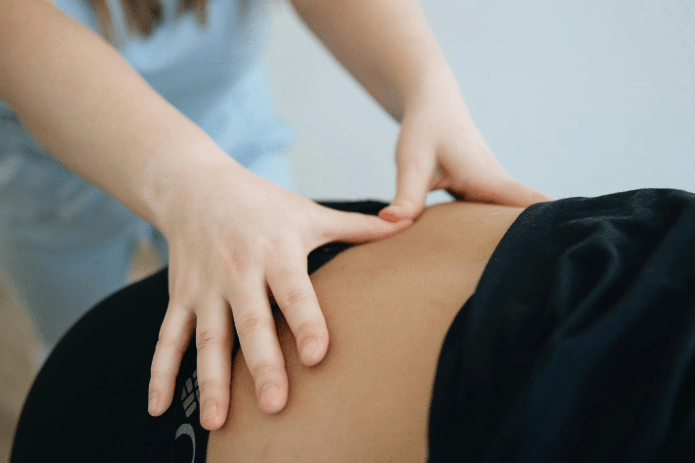 A person giving a massage