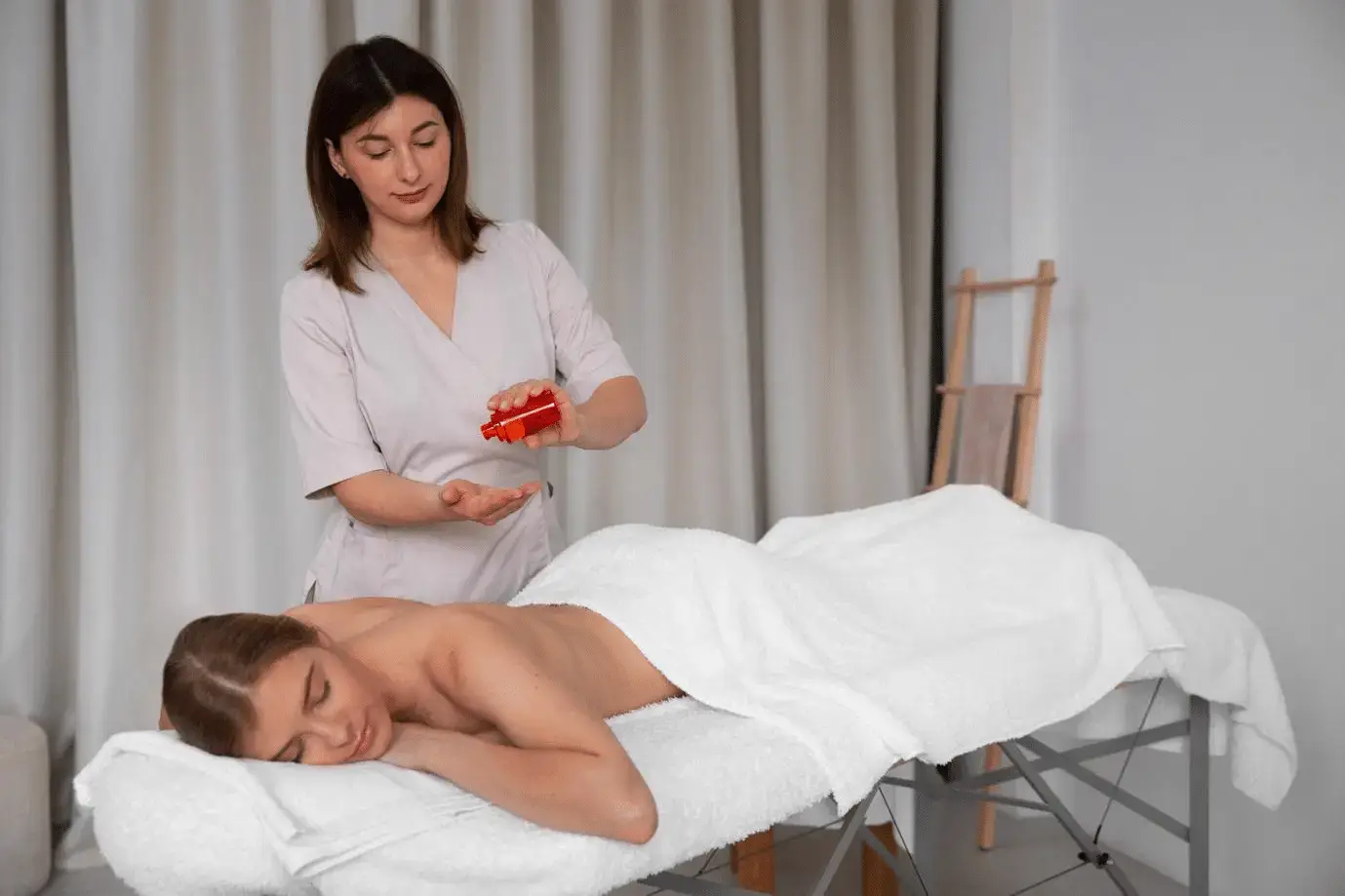 Woman enjoying a relaxing massage after sending kids to college